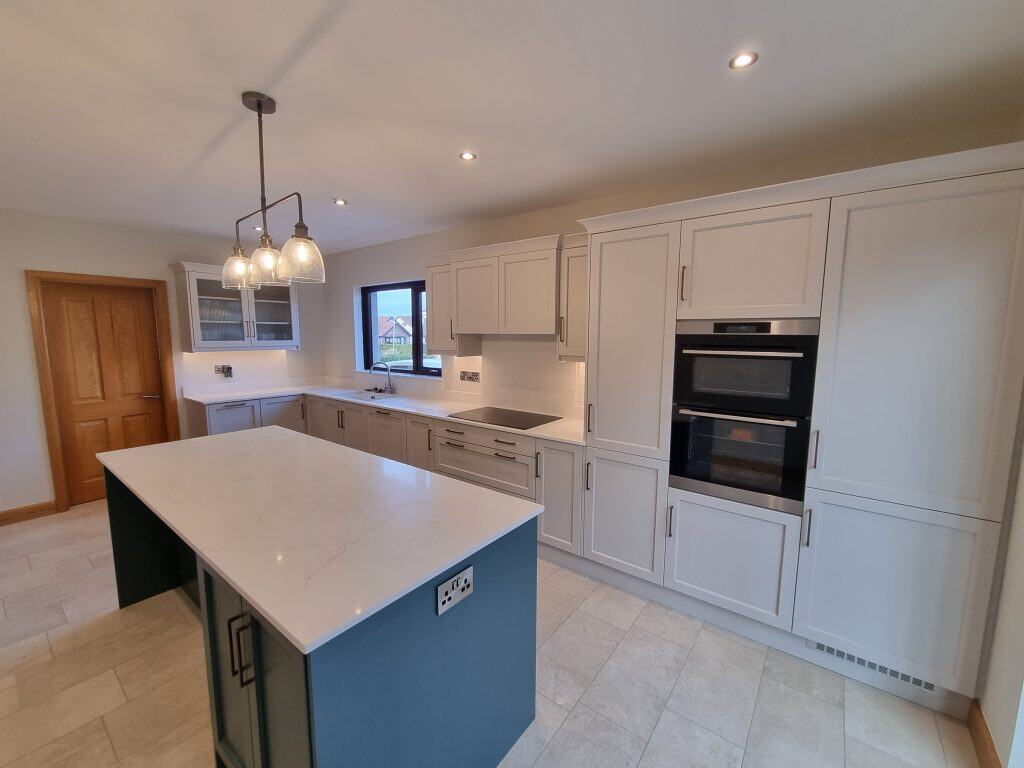modren gray kitchen with a blue island