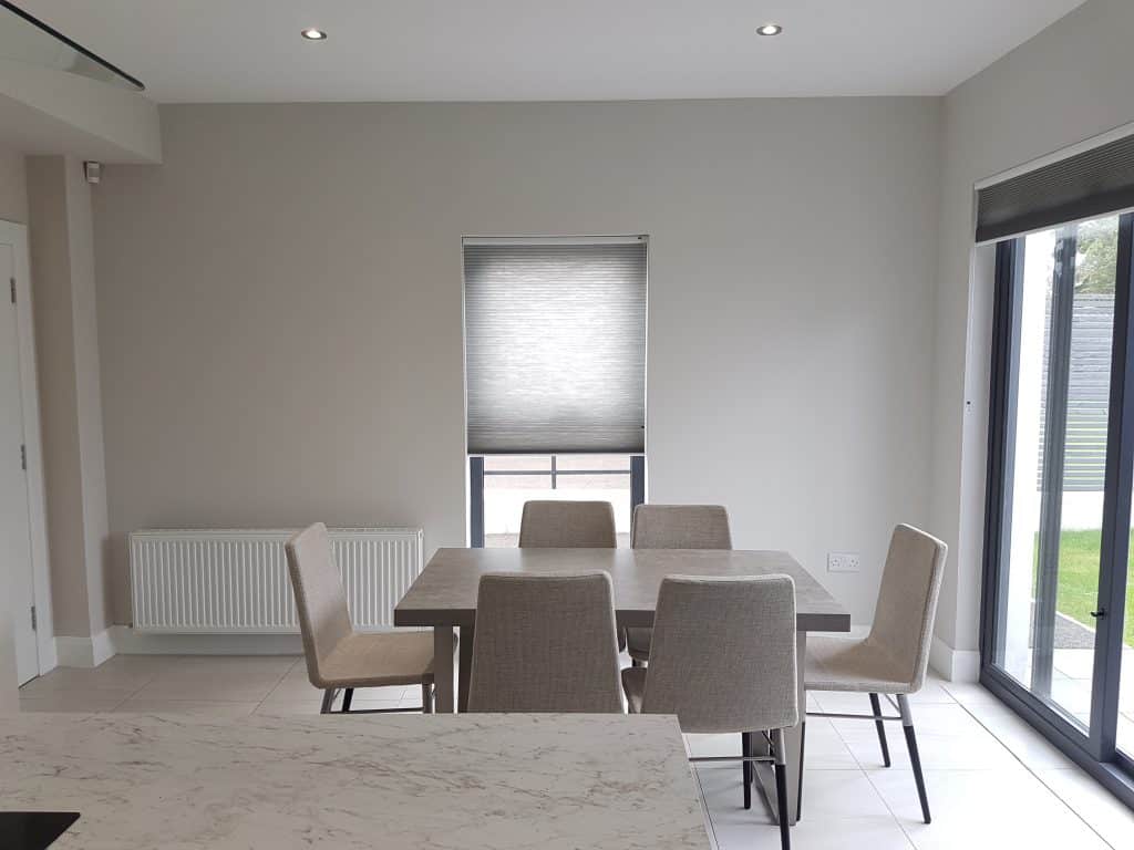 gray kitchen walls with a dinning table